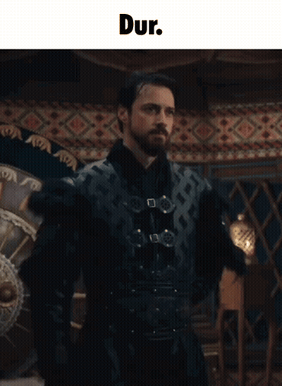 Man With Beard Standing Before Dur Sign GIF