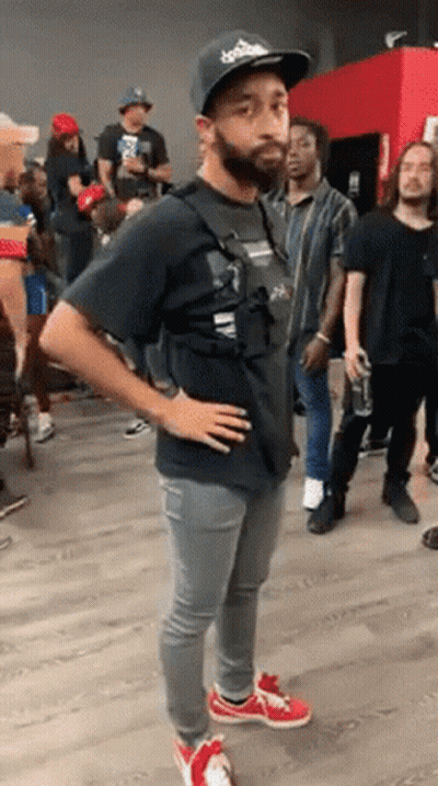 Man With Beard Standing Hands On Hips GIF