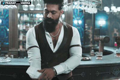 Man With Beard Standing In Front Of Bar Pranay Varma GIF