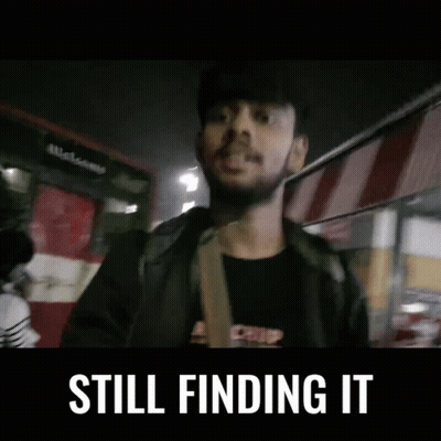 Man With Beard Standing In Front Of Bus Saying Still Finding It GIF