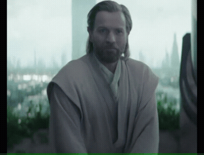 Man With Beard Standing In Front Of Large Window GIF