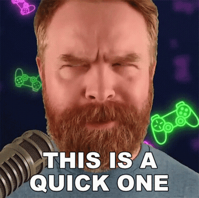 Man With Beard Standing In Front Of Microphone GIF