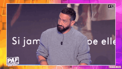 Man With Beard Standing In Front Of Paf Screen GIF