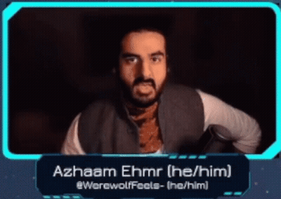 Man With Beard Standing In Front Of Screen Saying Azhaam Ehrmr GIF
