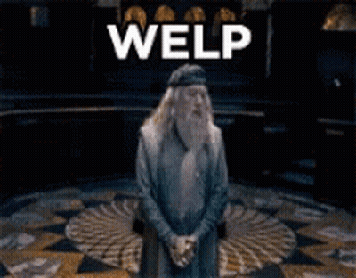 Man With Beard Standing In Front Of Welp Sign GIF