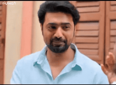 Man With Beard Standing In Front Of Window GIF