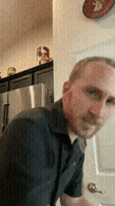 Man With Beard Standing In Kitchen GIF