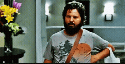 Man With Beard Standing In Room GIF