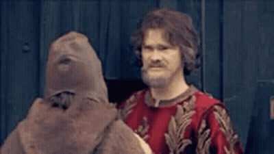 Man With Beard Standing Next To Stuffed Animal GIF