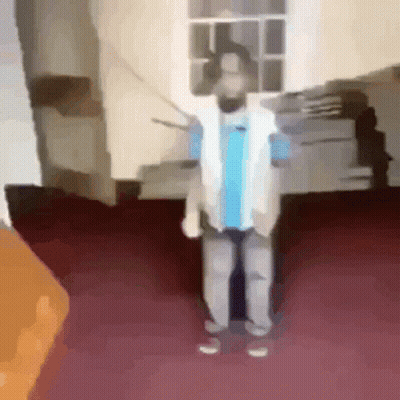 Man With Beard Standing On Red Carpet GIF