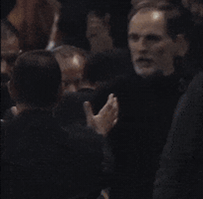 Man With Beard Surrounded By People GIF
