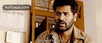 Man With Beard Talking About Friend With HIV GIF