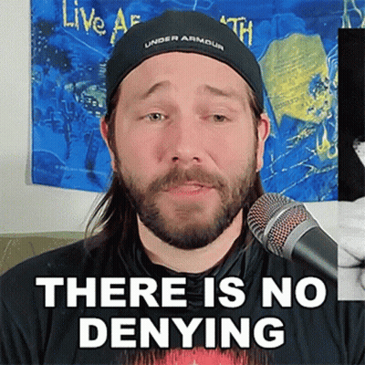 Man With Beard Talking Into Microphone Saying There Is No Denying GIF