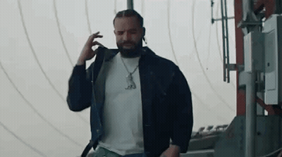 Man With Beard Talking On Cell Phone GIF