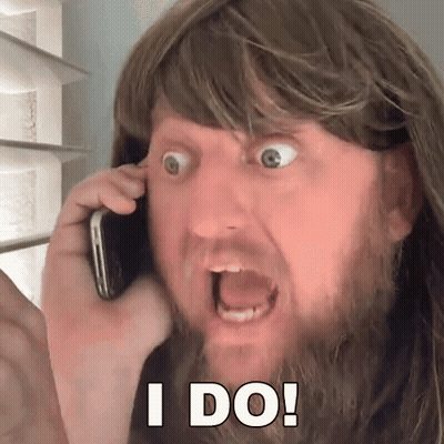 Man With Beard Talking On Phone GIF