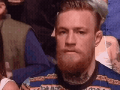 Man With Beard Watching Crowd GIF