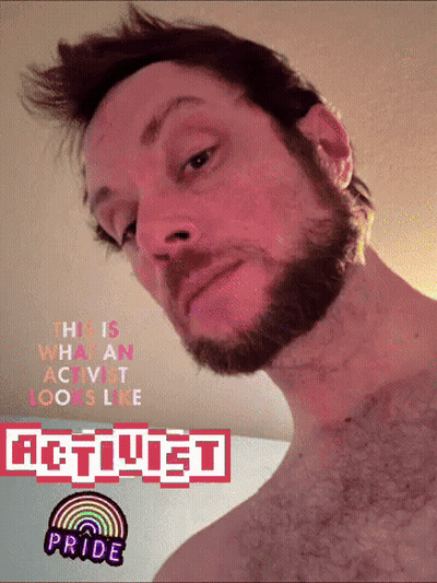 Man With Beard Wearing Activist Pride Sticker GIF