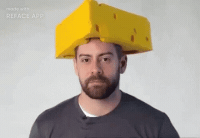 Man With Beard Wearing Cardboard Box on Head