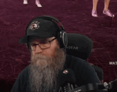Man With Beard Wearing Eagles Hat And Headphones GIF