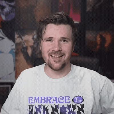 Man With Beard Wearing Embrace The Unknown Shirt GIF