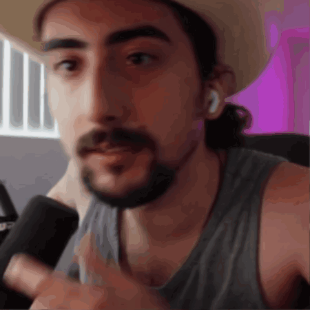 Man With Beard Wearing Hat And Grey Tank Top GIF