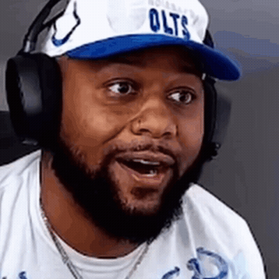 Man With Beard Wearing Hat And Headphones Making Funny Face GIF