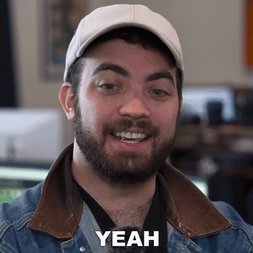 Man With Beard Wearing Hat And Jacket Says Yeah GIF