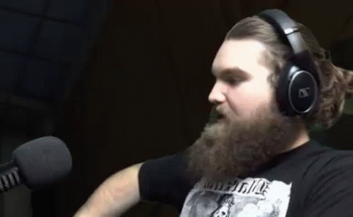 Man With Beard Wearing Headphones And Black Shirt GIF