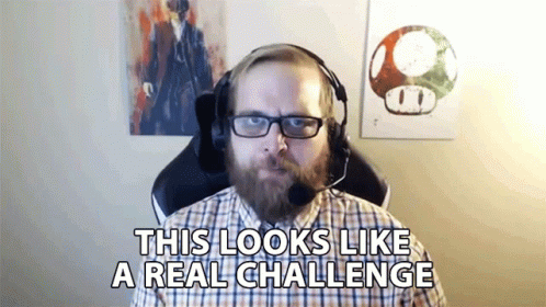 Man With Beard Wearing Headphones And Glasses Saying This Looks Like A Real Challenge GIF