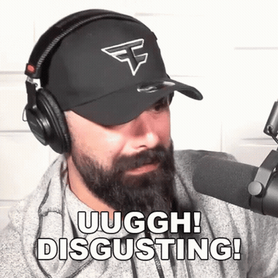 Man With Beard Wearing Headphones And Hat Says Disgusting GIF