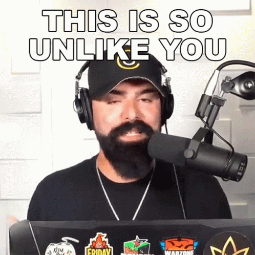 Man With Beard Wearing Headphones And Hat Says This Is So Unlike You GIF