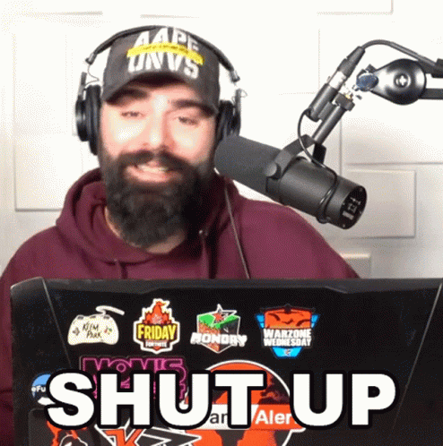 Man With Beard Wearing Headphones And Hat That Says Ape Univs GIF