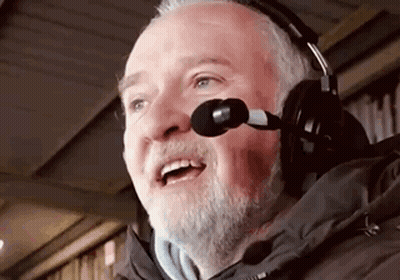 Man with Beard Wearing Headphones and Microphone