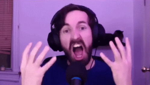 Man With Beard Wearing Headphones Making Funny Face GIF