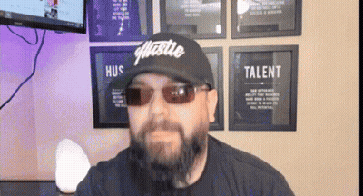 Man With Beard Wearing Hustle Hat GIF