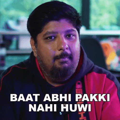 Man With Beard Wearing Red Jacket Baat Abhi Pakki Nahi Huvi GIF