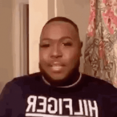 Man With Beard Wearing Tommy Hilfiger Sweater Smiling GIF