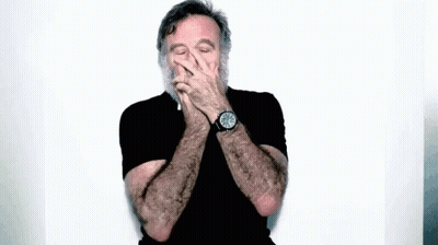 Man With Beard Wearing Watch And Black Shirt GIF