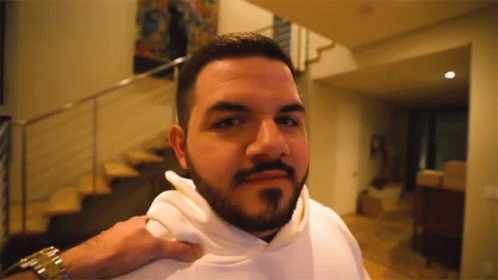 Man With Beard Wearing White Hoodie And Watch GIF