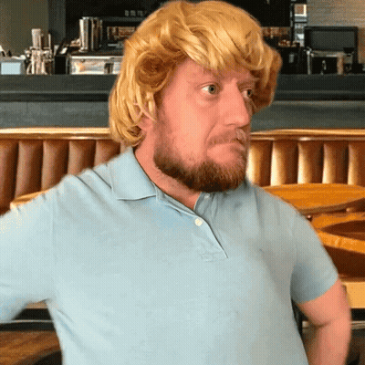 Man With Beard Wearing Wig And Blue Shirt GIF
