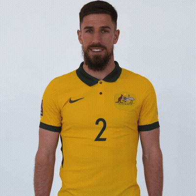 Man With Beard Wearing Yellow Shirt Saying Australia GIF