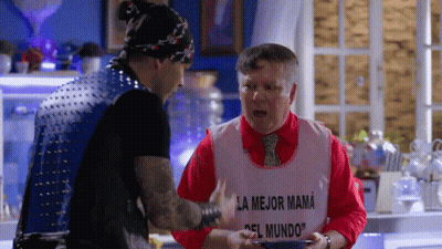 Man With Bib Saying La Mejor Mama GIF