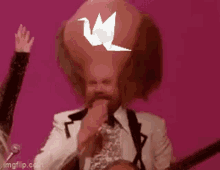 Man With Big Brain Blowing Kiss GIF