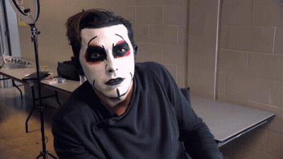 Man With Black And White Face Paint GIF
