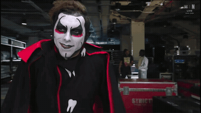 Man With Black And White Face Paint GIF