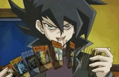 Man With Black Hair Holding Cards GIF