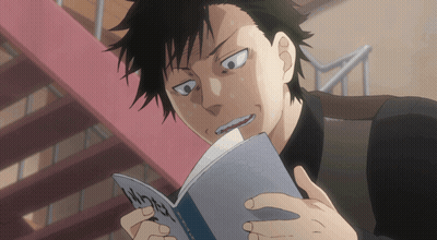 Man With Black Hair Reading Chinese Book GIF