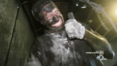 Man With Black Paint Smiling At Home & Home Tech Sign GIF