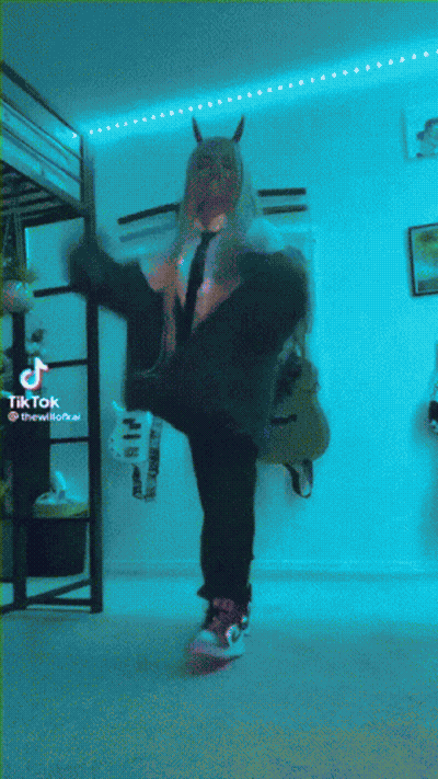 Man With Black Wings Looking At Camera GIF