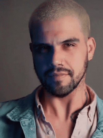 Man With Blonde Hair Beard Denim Jacket Earrings GIF